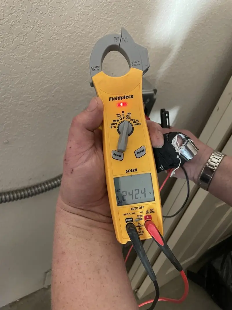 Voltage testing with clamp meter during Recessed Lighting Installation in Du Quoin
